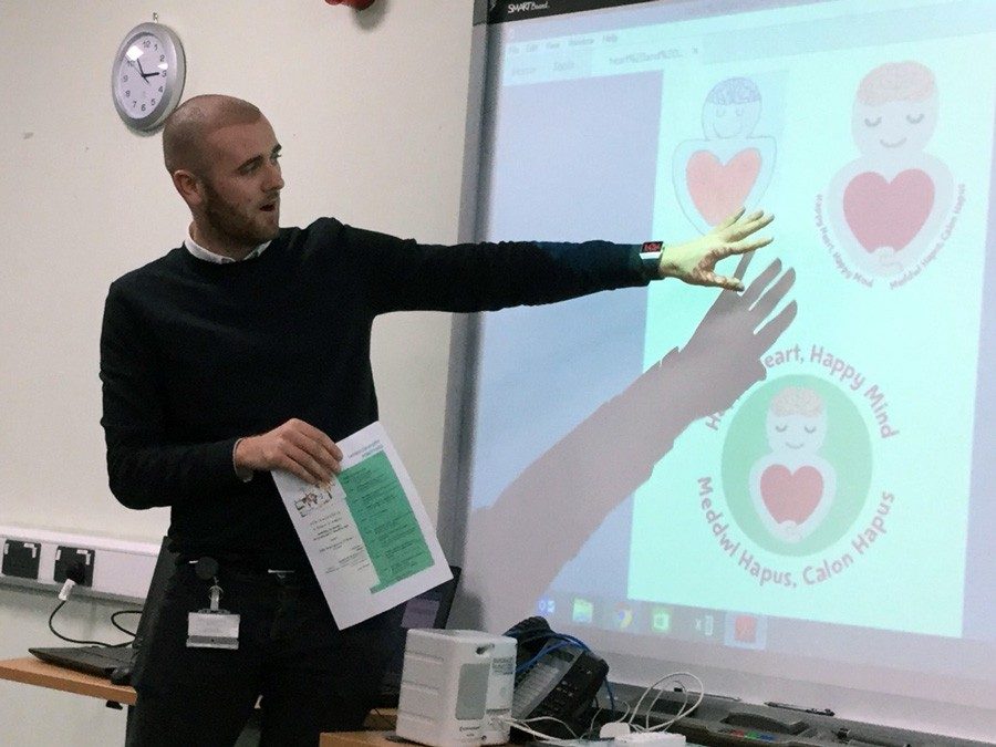 Cllr-Josh-Beynon---presenting-wellbeing-website-to-headteacher-in-Pembrokeshire